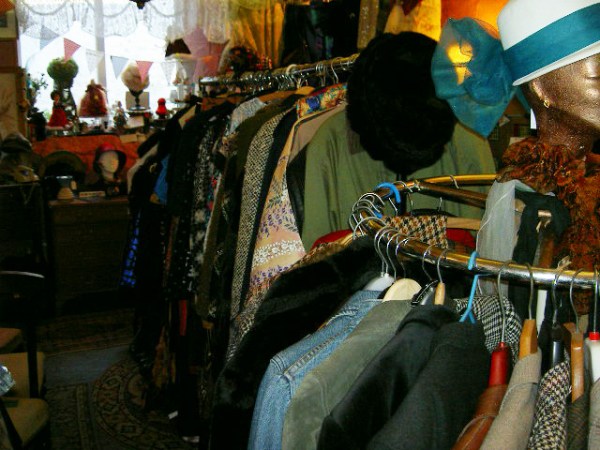 Racks and racks of vintage clothes, including Christmas party clothes