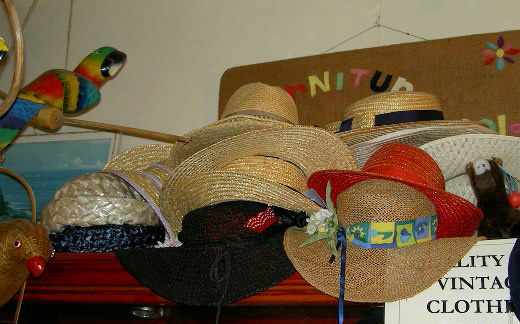 A rack of hats, ready for next summer