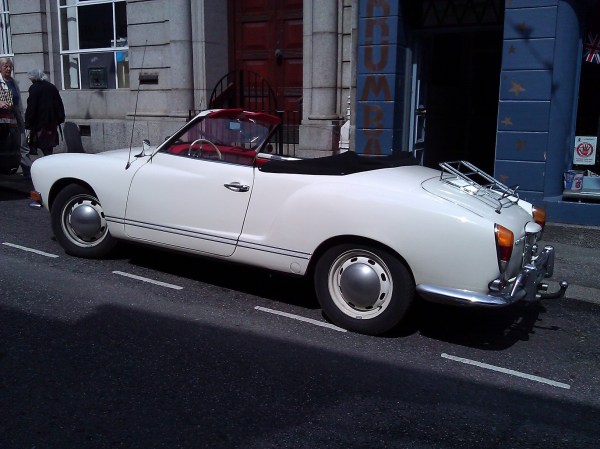 Side view of white car